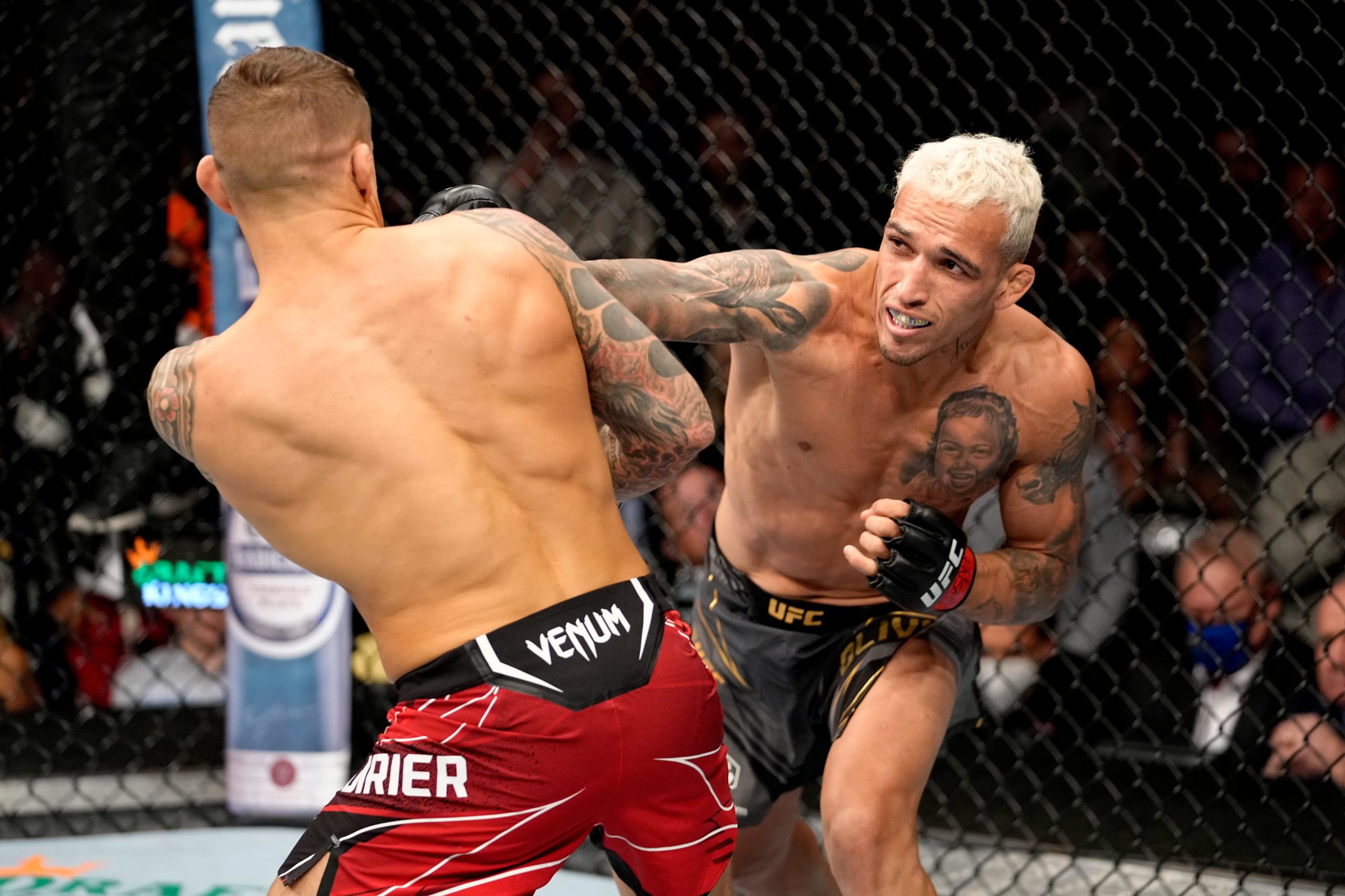 Oliveira beat Poirier: Champion Charles Oliviera retains crown after Dustin Poirier submission in UFC 269, continues winning streak