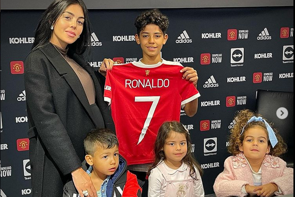 Cristiano Ronaldo: Cristiano Jr. poses with Man United jersey No.7 as he signs for Manchester United Academy; Check pictures