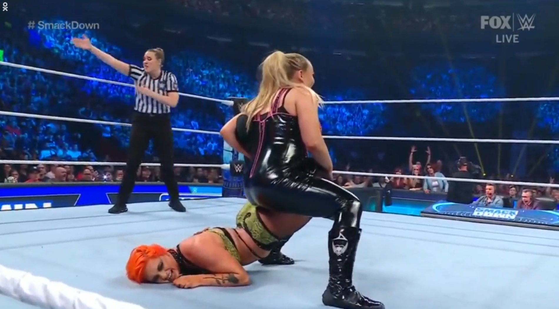 Natalya attempts sharpshooter on Gigi Dolin