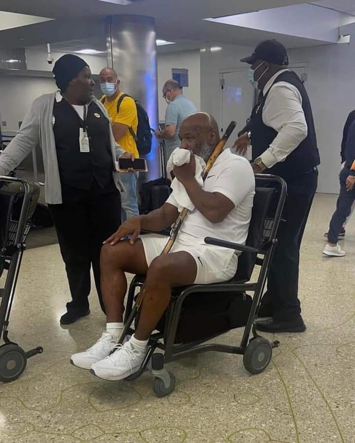Mike Tyson UNWELL? Heartbreak for BOXING FANS as Mike Tyson SPOTTED in a wheelchair at Miami Airport: CHECK OUT