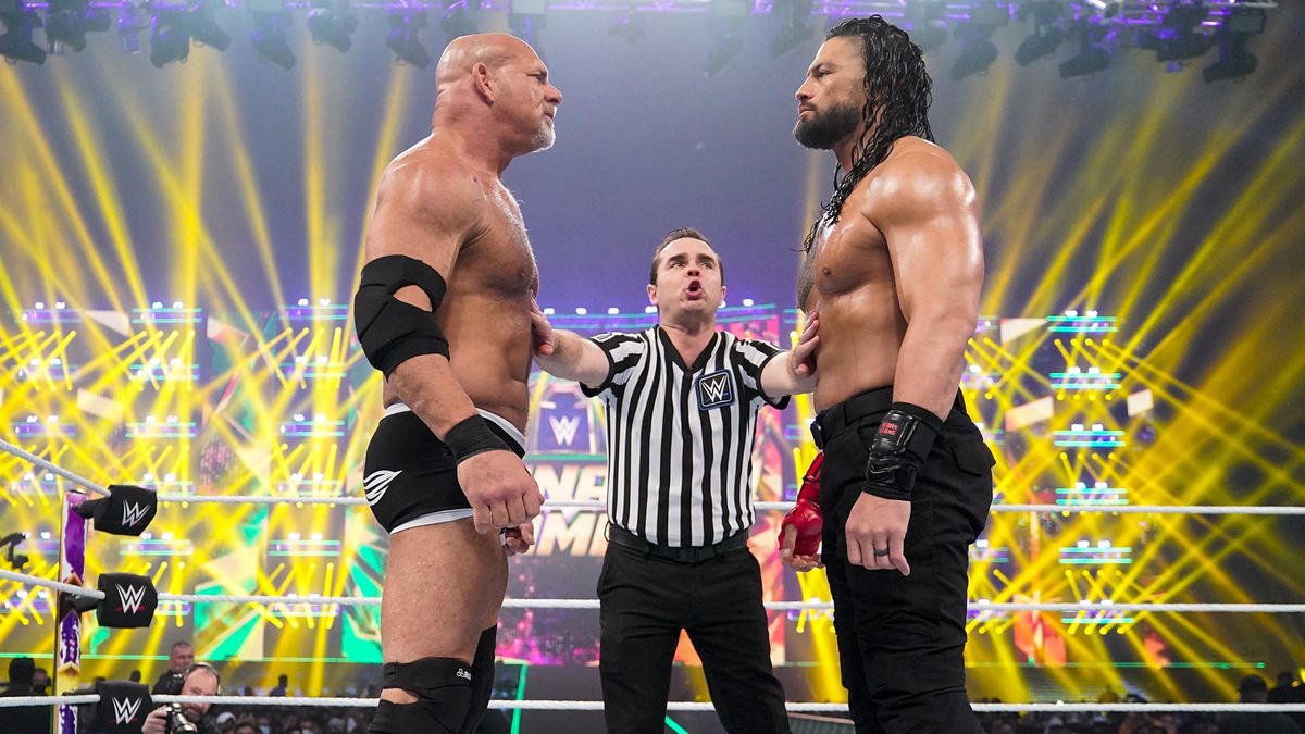 Goldberg vs Roman Reigns 