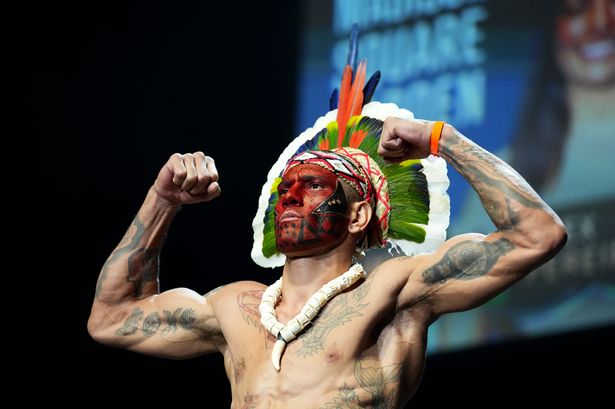 LOOK: Proud Brazilian UFC Champ Alex Pereira Brings His World Championship  to His Native Tribe - EssentiallySports