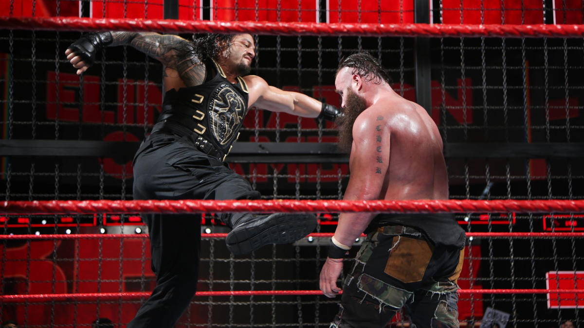 Roman Reigns delivers superman punch to Braun Strowman 
