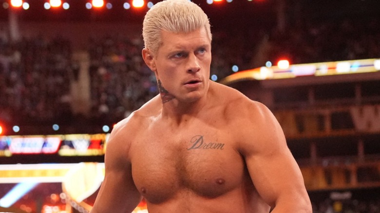 WWE Legend Pokes Fun at Cody Rhodes Neck Tattoo With a Cheeky Dig   EssentiallySports